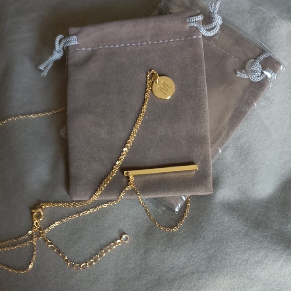 Two Gold Necklaces W/Mini Taupe Velvet Drawstring Pouch.